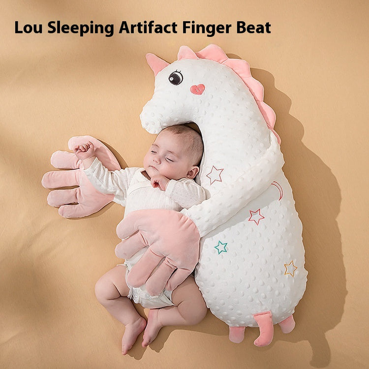 Baby sleeping with a dinosaur-shaped pillow on a beige background