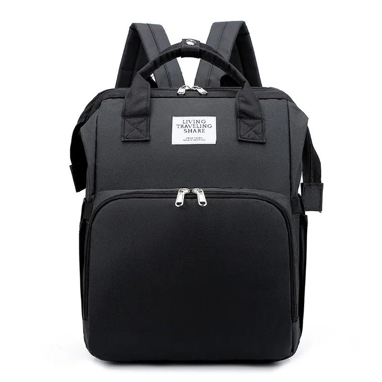Black backpack with a visible brand label on a white background