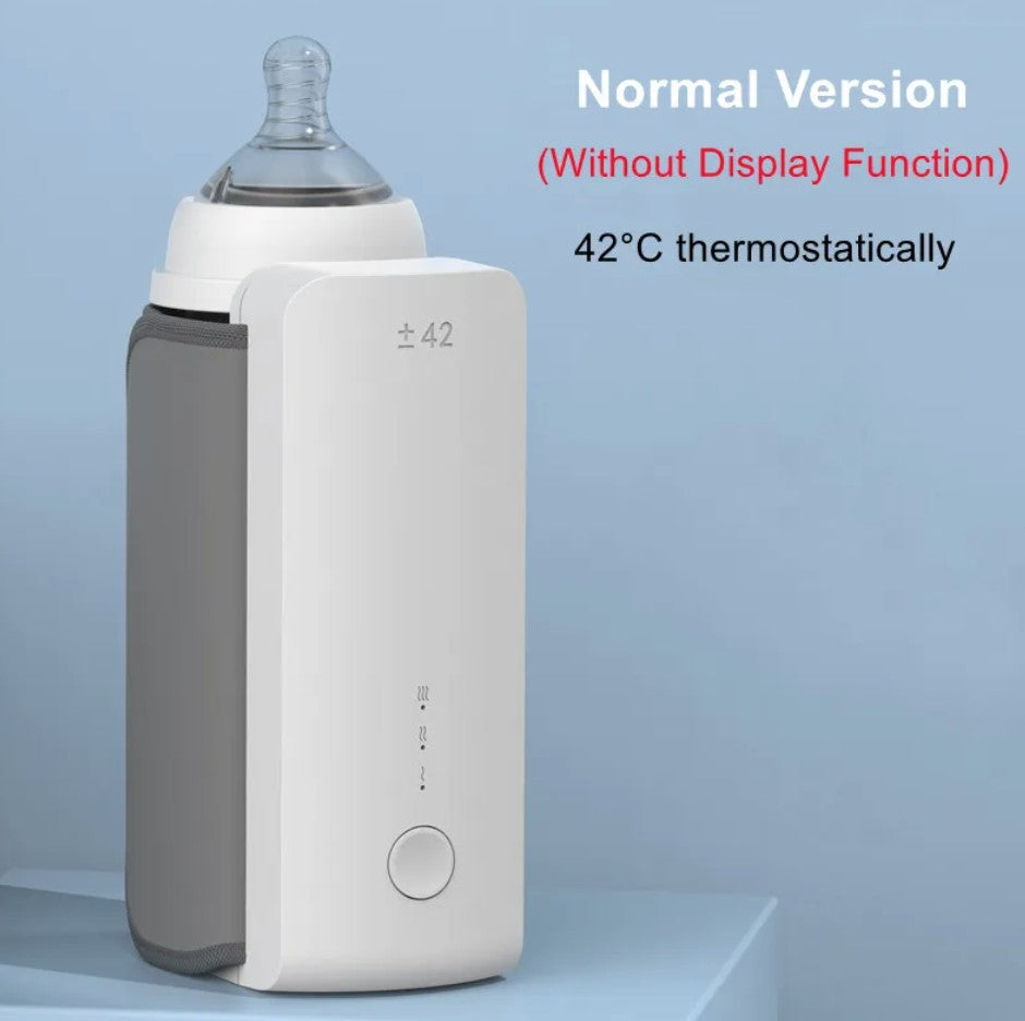 Baby bottle warmer with text indicating normal version and temperature control on a light blue background