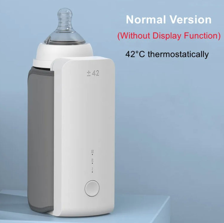 Baby bottle warmer with text indicating normal version and temperature control on a light blue background