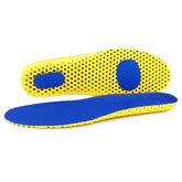 Blue and yellow shoe insoles on a white background