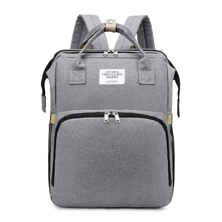 Gray backpack with visible brand label on a white background