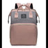 Two-tone backpack with gray top section and pink bottom section on a white background