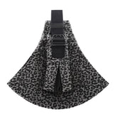 Leopard print dog harness on a white background