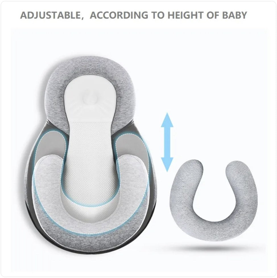 Adjustable baby support pillow with height adjustment feature on a white background