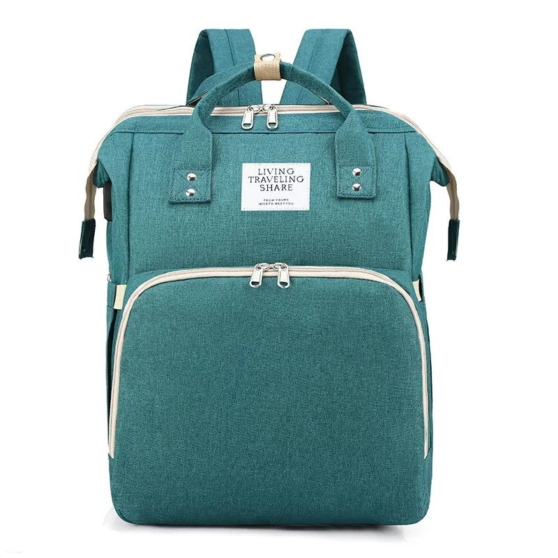 Teal backpack with visible brand label on a white background