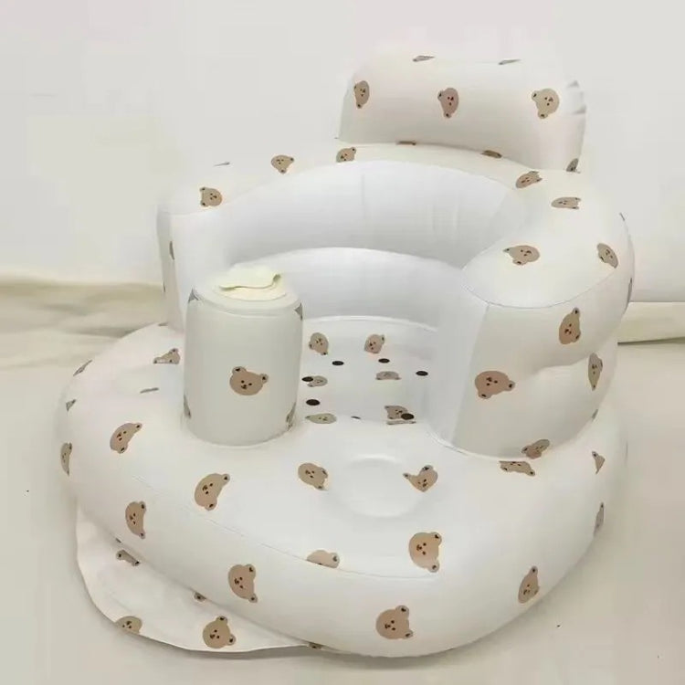 White inflatable baby seat with bear pattern on a white background