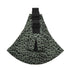 Leopard print dog muzzle with black straps on a green background