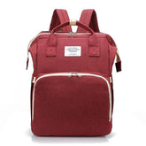 Red backpack with white accents on a white background