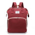 Red backpack with white accents on a white background