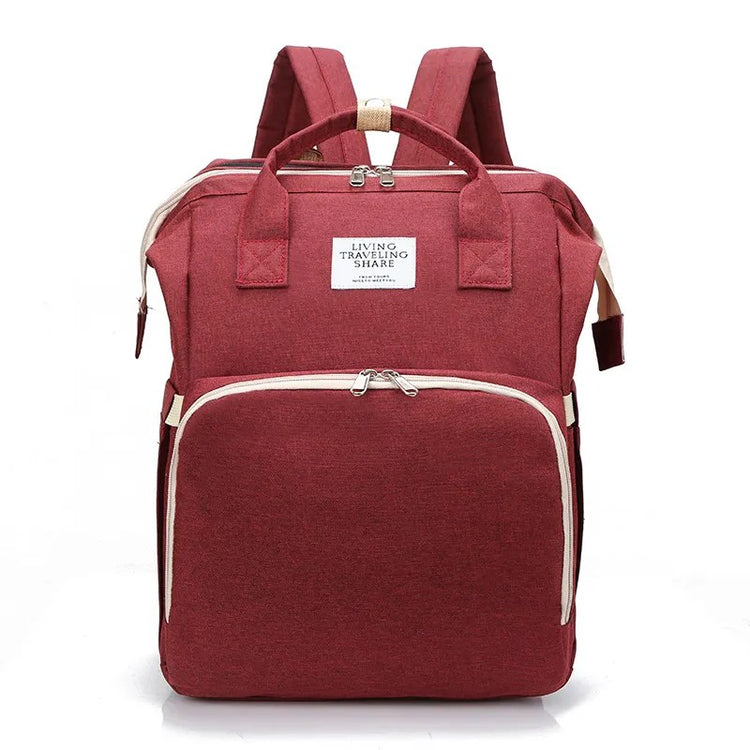 Red backpack with white accents on a white background